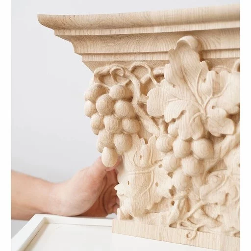 Pilaster caps with the bunch of grapes and leaves