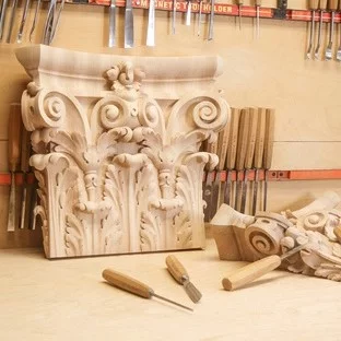 Corinthian pilaster capital with volutes and flowers