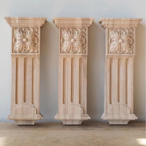 Ornate corbel with flutes and floral element
