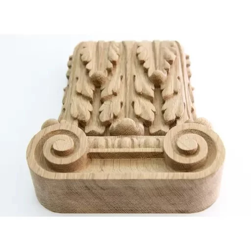 Flower garland on capital for fluted pilaster ionic order