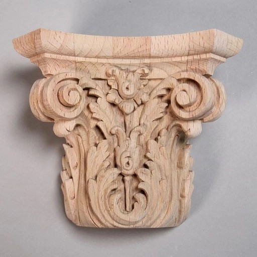 Corinthian capital for half column with bellflowers and volutes